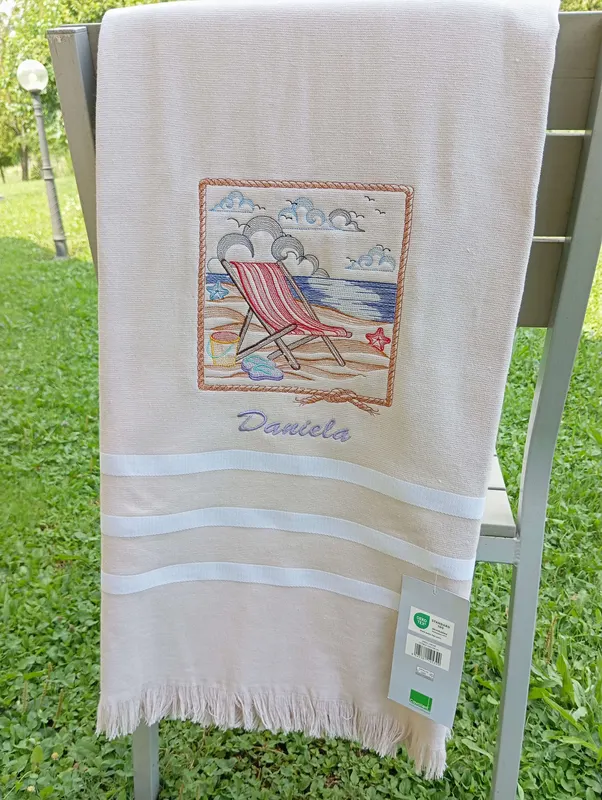 Telo mare ricamato con nome