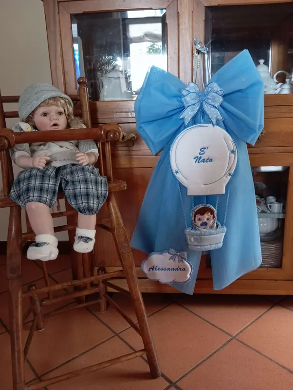 Fiocco nascita azzurro con mongolfiera
